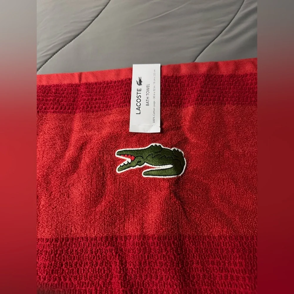 Lacoste beach/bath towel NWT.